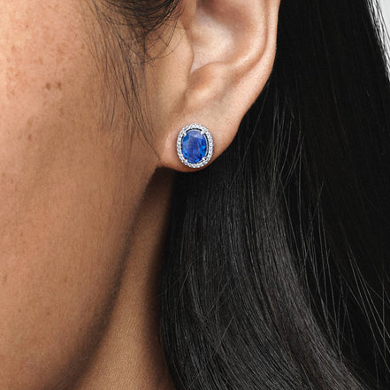 Ohrstecker mit blauem Kristall und Zirkoniarand