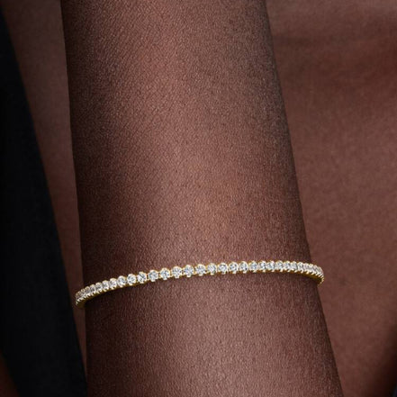 TIMELESS Tennisarmband goldfarben