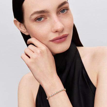 Goldfarbenes Tennisarmband mit Zirkonia