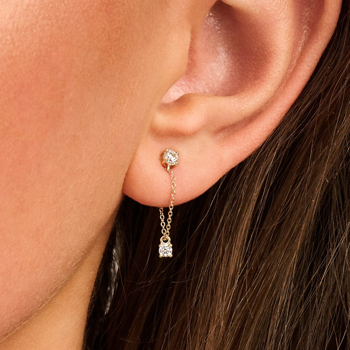 Ohrstecker aus 585er Gold mit Zirkonia an Kette