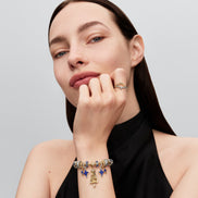 Sternförmiger Charm mit blauer Emaille