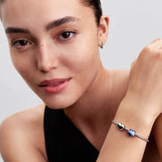Charm UNICEF blauer Stern