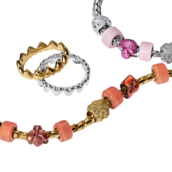 Mini-Charm orangene Musiknote