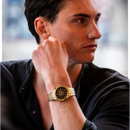 Herrenuhr goldfarben braun