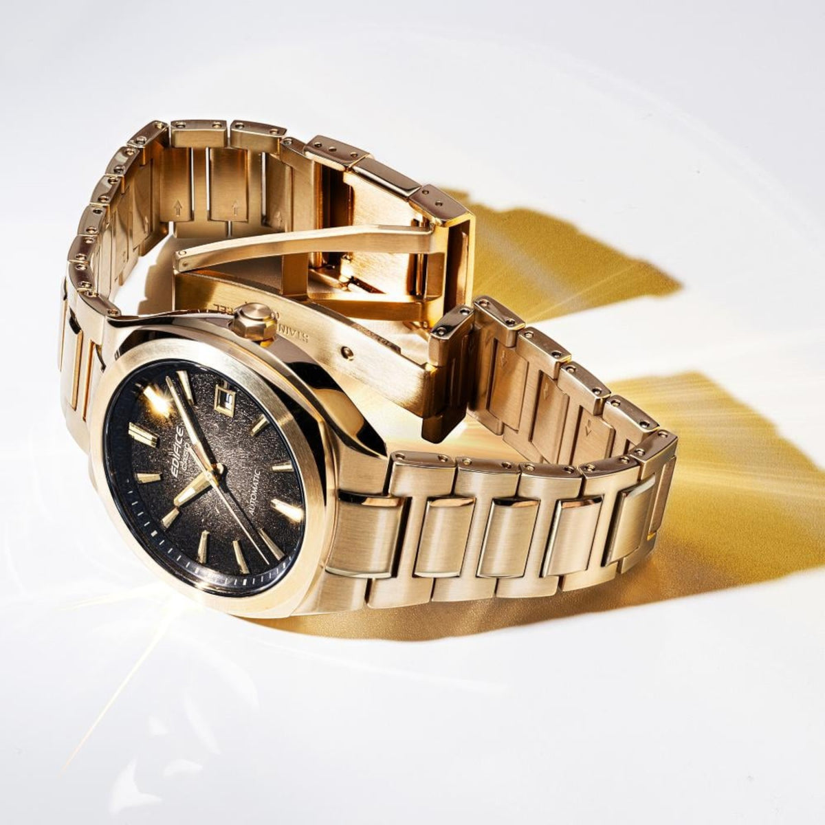 Herrenuhr goldfarben braun